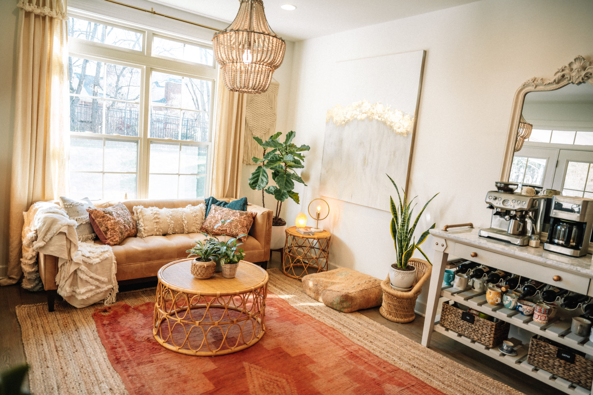 boho interior design nashville breakfast nook beaded chandelier moroccan layered rug house plants