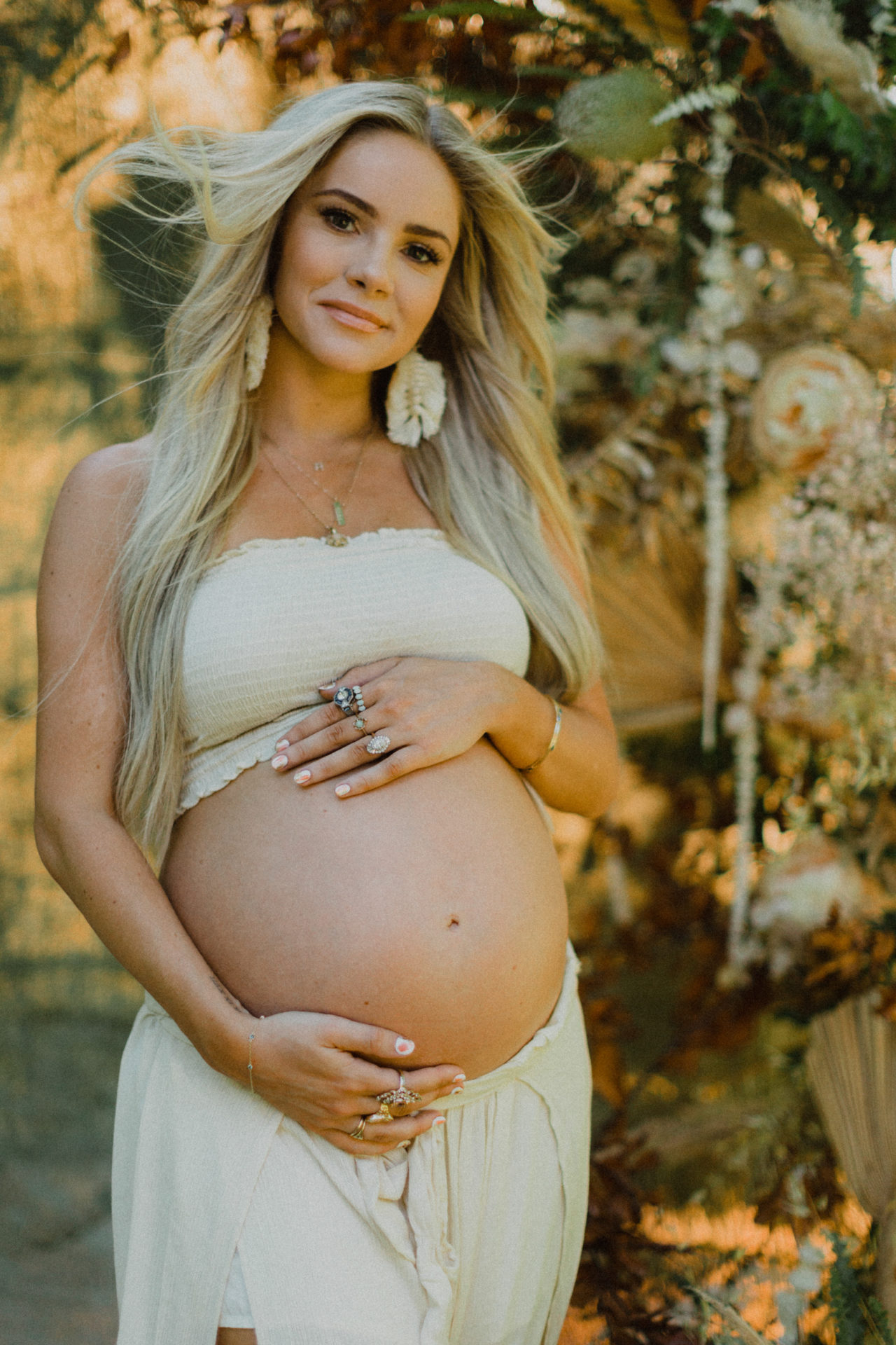 outdoor maternity shoot with wild flowers