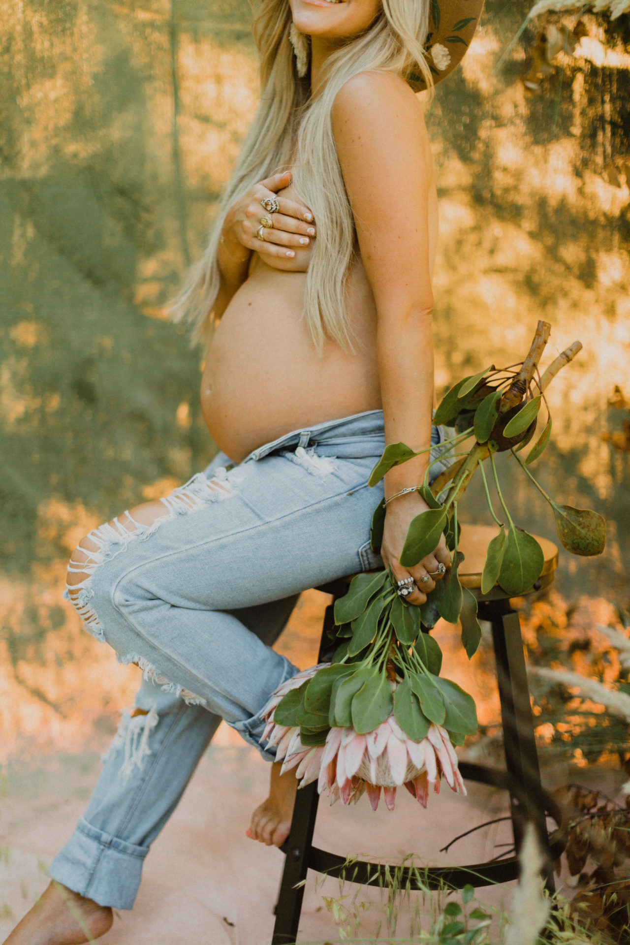 natural outdoor maternity shoot with wildflowers