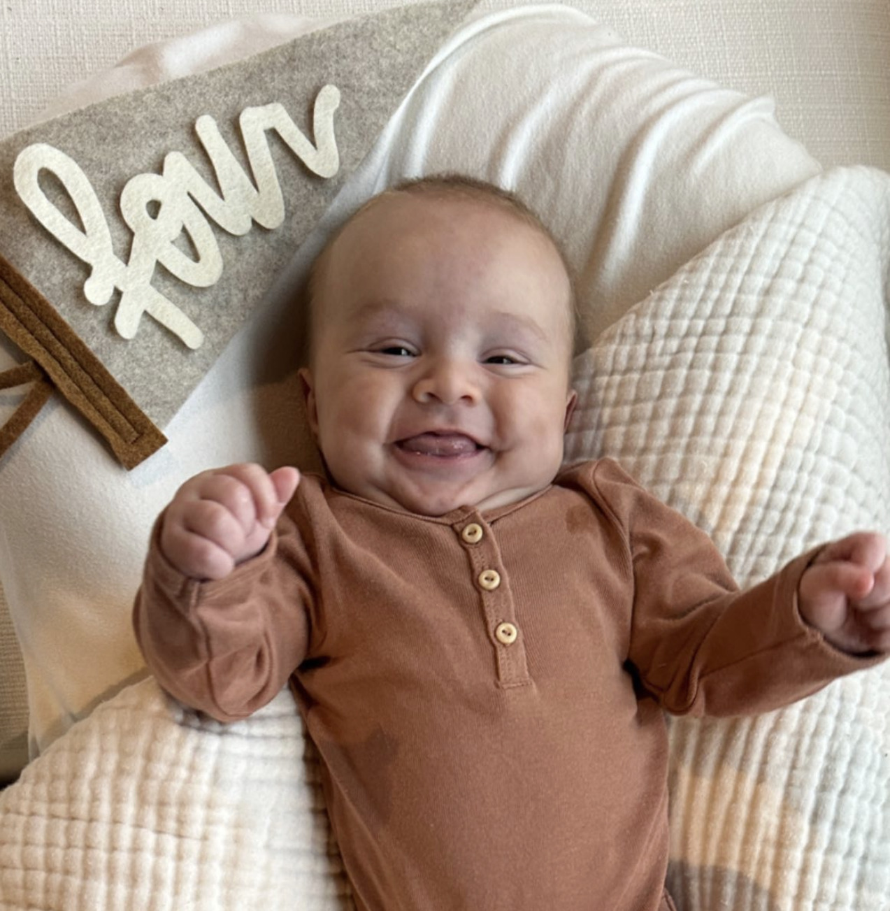 three-month-old-baby-poses-on-bed-by-just-maggie-photography-los